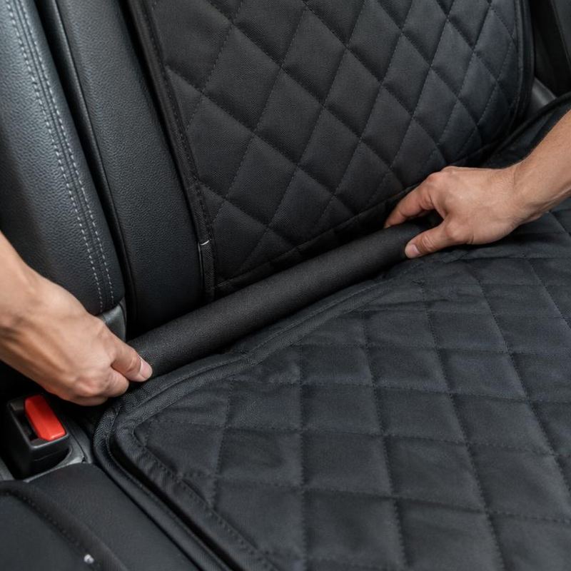 Tuck the anchors into the seat crease.